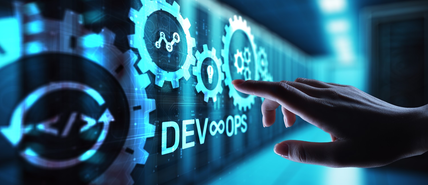 Hand activating a DevOps cycle on a digital interface