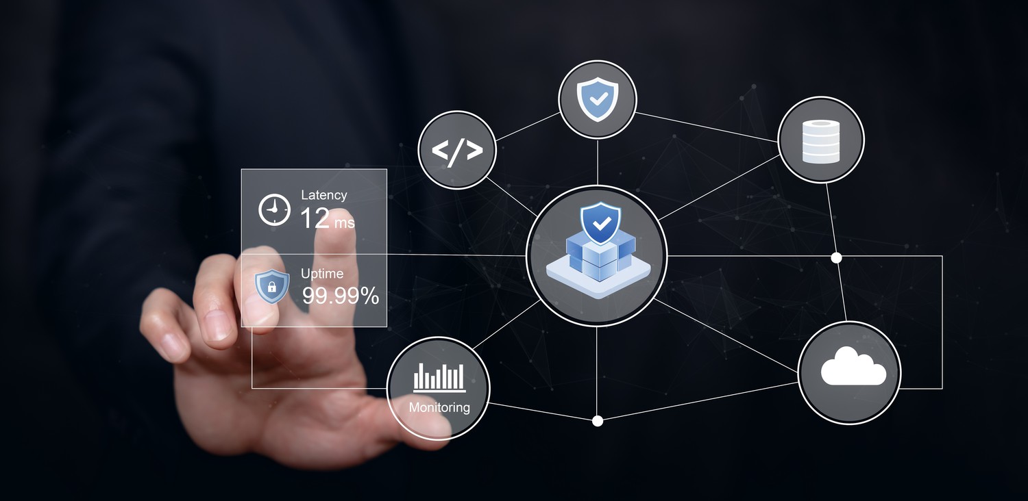 Hand touching a map of cloud services with latency and availability indicators
